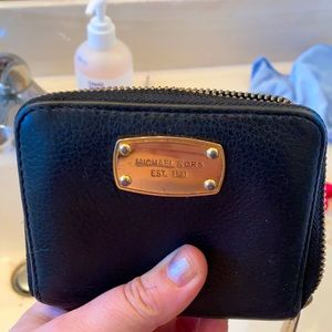 Micheal Kors black zip up wallet leather